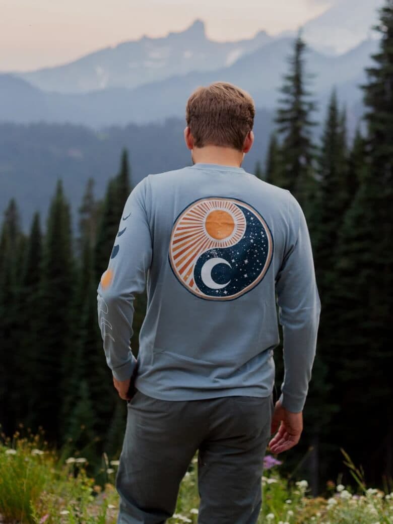 Man wearing a Happy Earth long-sleeved shirt